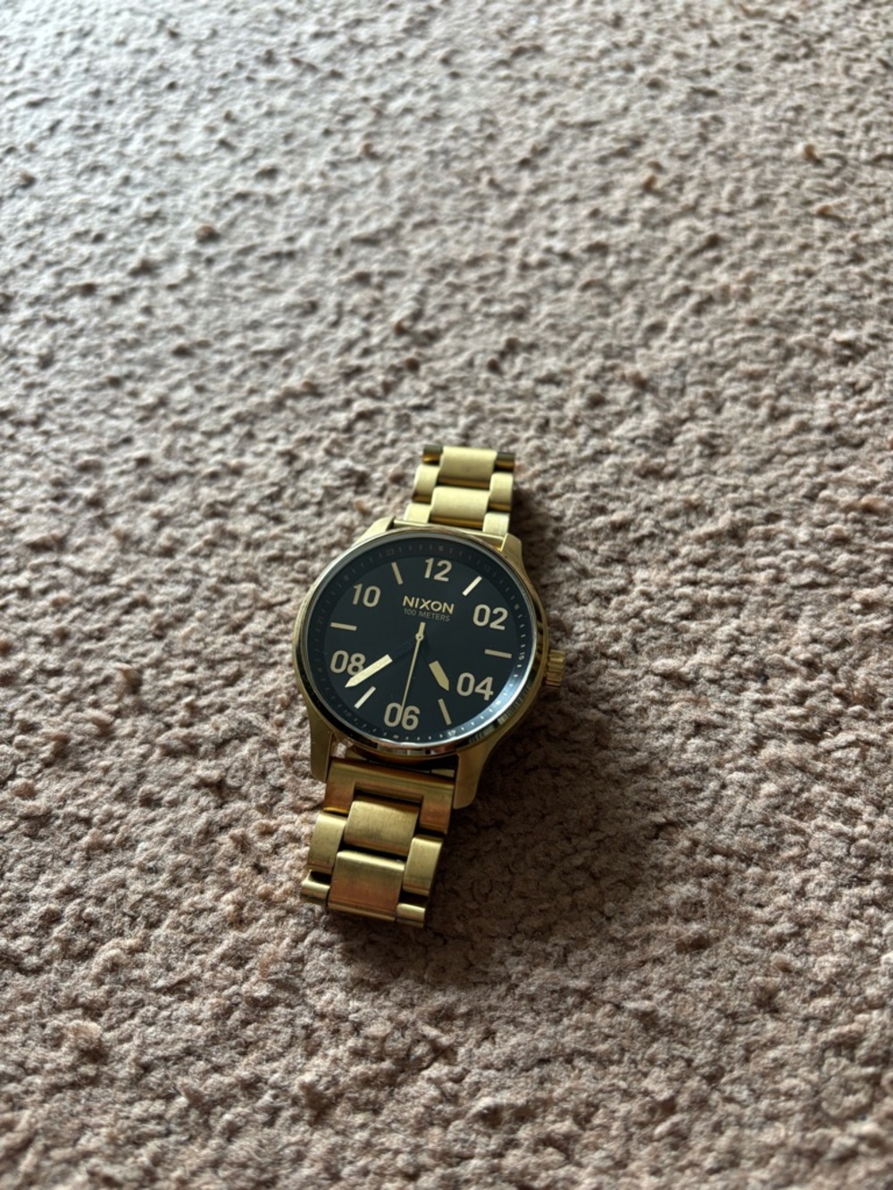 Nixon Gold Bracelet Watch with Black Dial